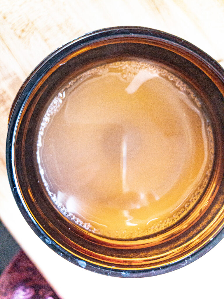 Sauerkraut brine in a brown jar