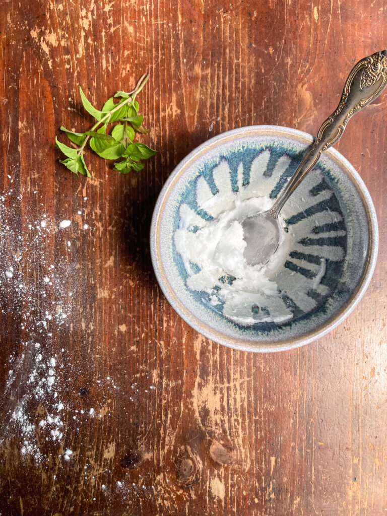 homemade toothpaste sitting on table